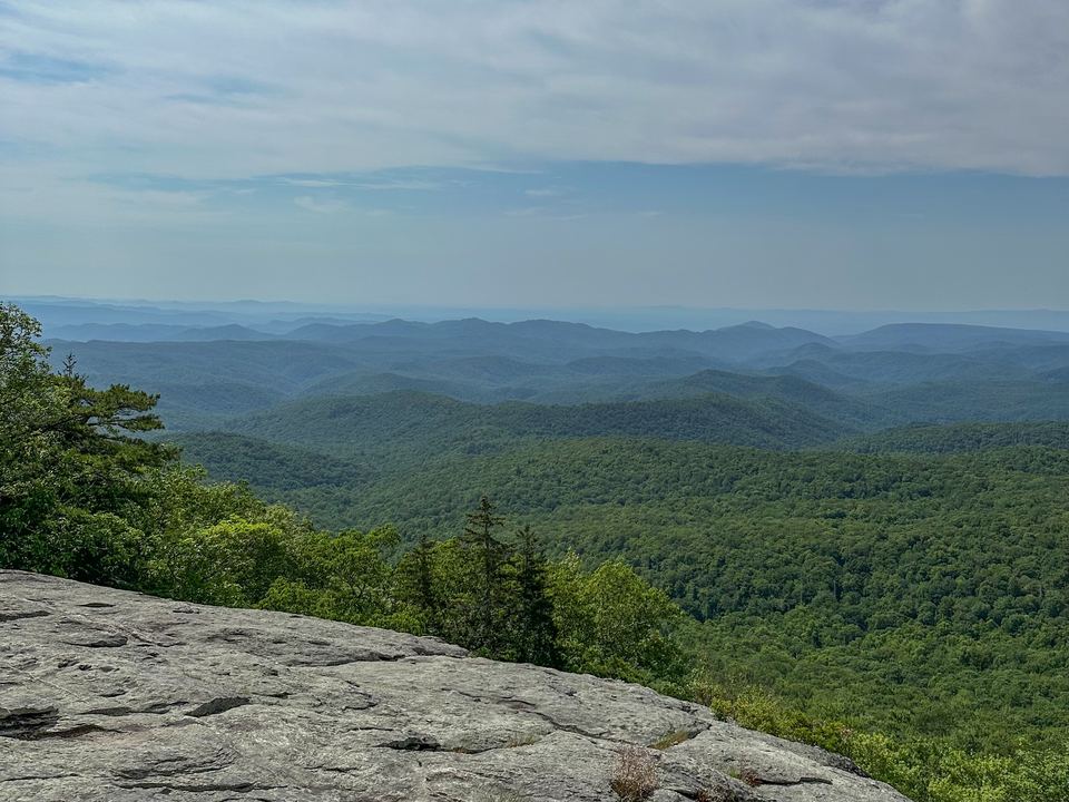 Open rock slabs at Beacon Heights looking over green ridges